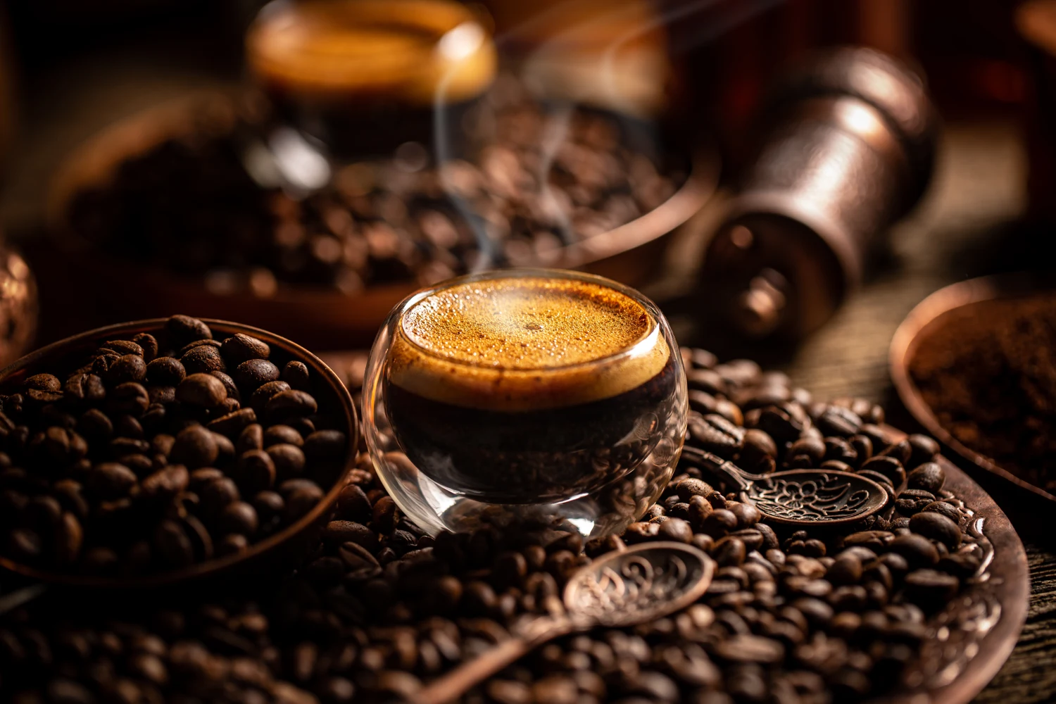 Espresso surrounded by coffee beans
